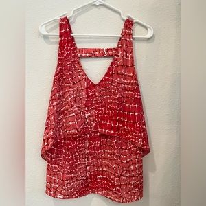 Animal print/multi shades of coral/white/brown.